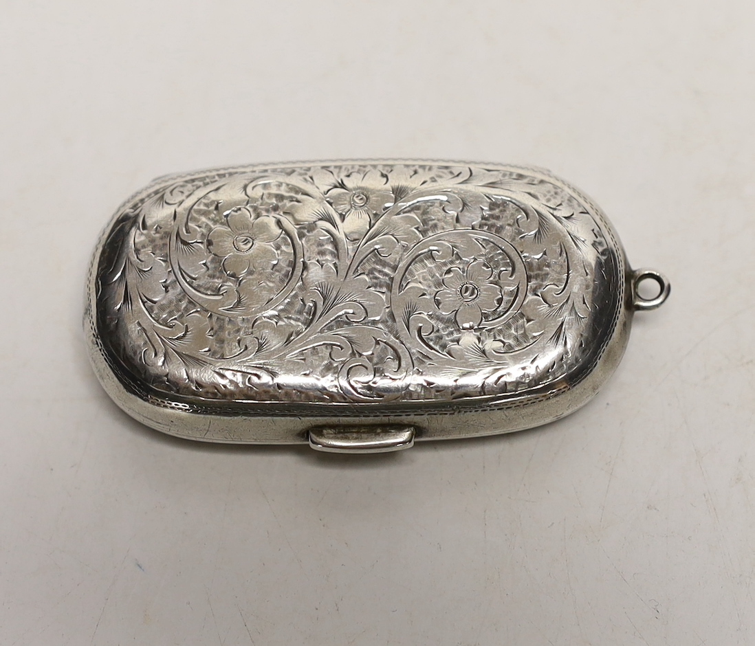 An Edwardian engraved silver oval double sovereign case, by Colen Hewer Cheshire, Chester, 1908, 58mm.